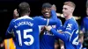 Noni Madueke (centre) is congratulated by Cole Palmer (right) after he set up Chelsea’s fourth goal for Nicolas Jackson (lef