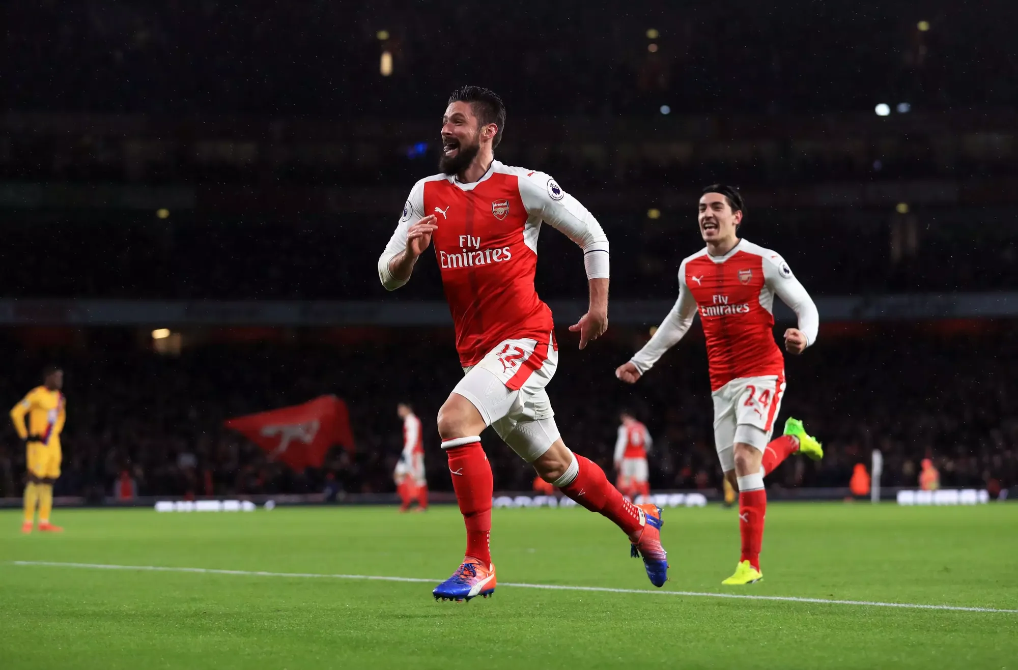 Olivier Giroud celebrates his stunning scorpion kick