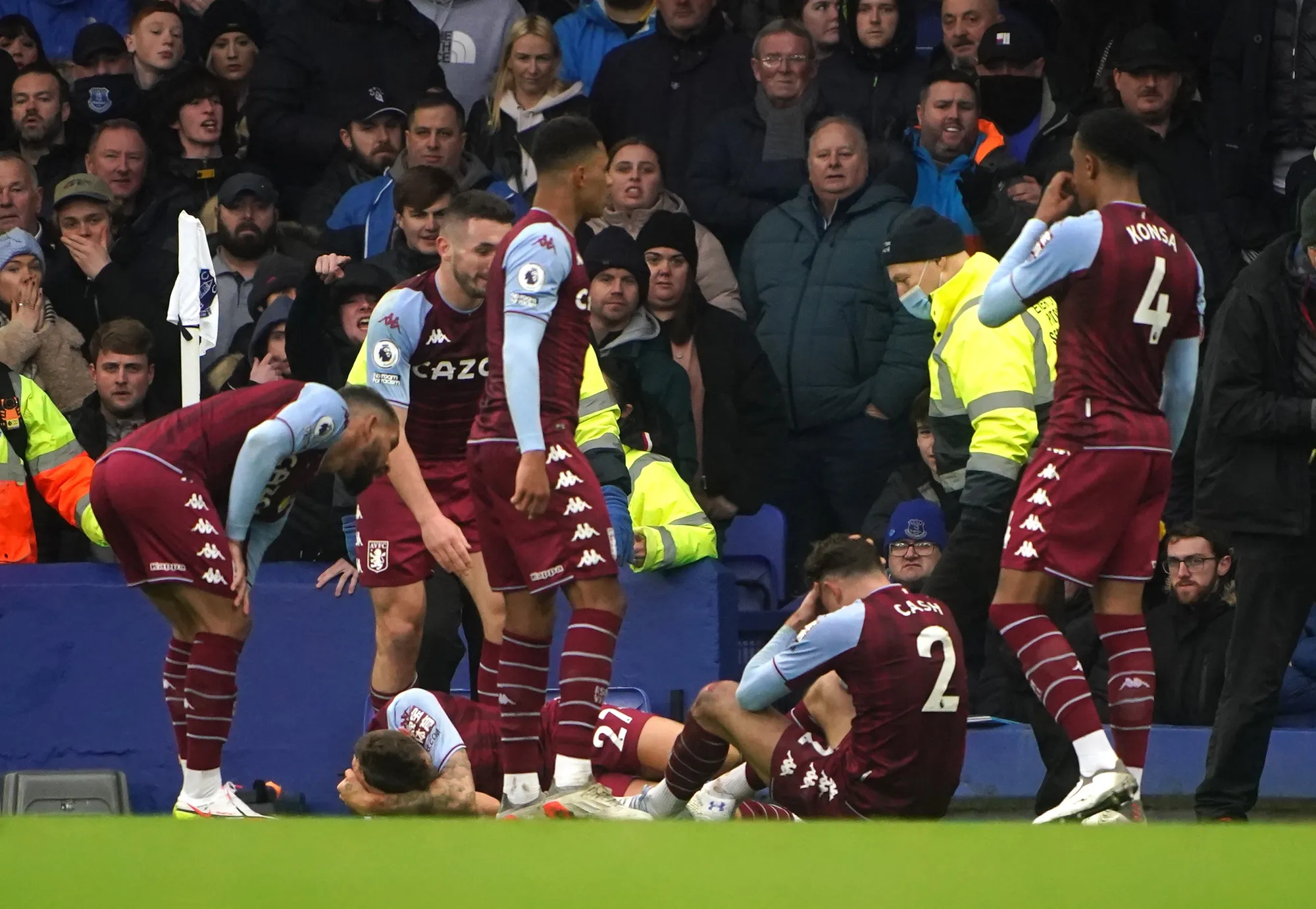 Aston Villa players Lucas Digne and Matty Cash were struck by a bottle thrown by the Goodison crowd