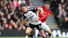 Fulham’s Joao Palhinha (left) and Manchester United’s Mason Mount battle for the ball (PA)