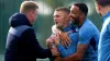 Newcastle’s Kieran Trippier and Callum Wilson speak to manager Eddie Howe during a training session at the Newcastle United 