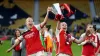 Arsenal’s Beth Mead (left) and Kim Little lift the Continental Tyres League Cup trophy following victory during the FA Women