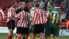 Referee Eddie Wolstenholme was caught in the middle of a melee between Sheffield United and West Brom players at the ‘Battle