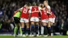 Arsenal players huddle in their mismatched kit before taking on Chelsea (Nigel French/PA)