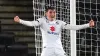 Milton Keynes Dons’ Max Dean celebrates their side’s second goal of the game, an own goal scored by AFC Wimbledon’s Ryan Joh