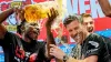Leverkusen’s head coach Xabi Alonso, centre, is sprayed with beer after Bayer Leverkusen won the Bundesliga title (AP Photo/