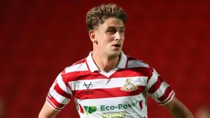 George Miller and Harrison Biggins fired Doncaster to victory at Grimsby