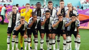 Germany players cover mouths for team photo in protest over OneLove armband ban