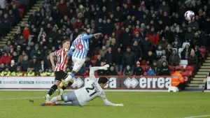 Billy Sharp fires Sheffield United to victory over Huddersfield in drab affair