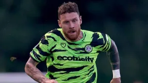 Connor Wickham on the spot as 10-man Forest Green sink Cambridge
