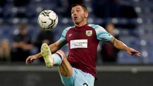 Phil Bardsley signs for Stockport and donates his wages to charity