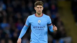 John Stones fires title warning to Arsenal after Man City cut gap to five points