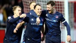Kristian Dennis bags a brace as Carlisle close in on top three
