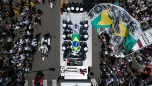 Thousands line streets to bid final farewell to Brazil great Pele