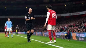 Arsenal and Man City fined for surrounding referee Anthony Taylor