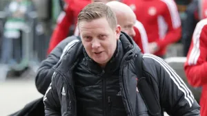 Barry Robson assures chairman Dave Cormack that Aberdeen in good hands