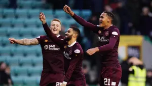 Hearts hit back to beat 10-man Dundee United