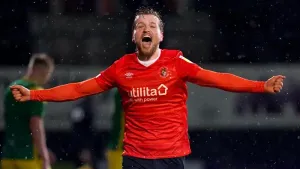 Substitute Luke Berry nets late equaliser as Luton fight back to hold Millwall