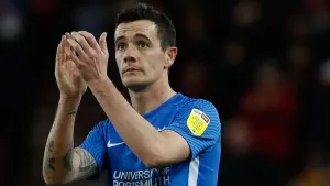 Captain Shaun Williams leads Gillingham to victory over Tranmere