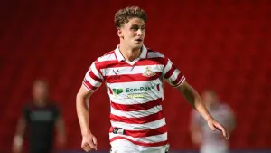 Harrison Biggins and George Miller fire Doncaster to victory over AFC Wimbledon