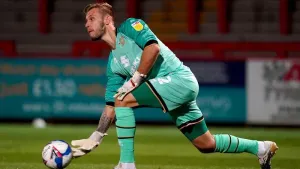 Laurie Walker stars with two penalty saves as Barnet draw with Woking