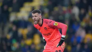 Norwich battle their way to a point as keeper Angus Gunn frustrates Stoke