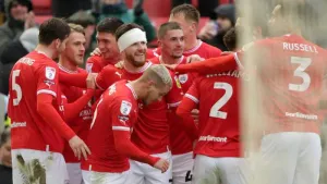 Plymouth’s promotion charge halted by in-form Barnsley