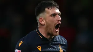 Andy Cook scores late winner as Bradford battle back to beat Grimsby