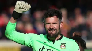 Ben Foster kissed ‘fully on the lips’ by Rob McElhenney after Wrexham heroics