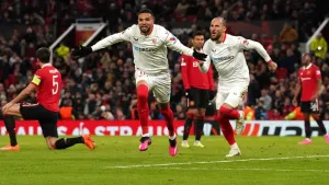 Late Tyrell Malacia and Harry Maguire own goals hand Sevilla a draw at Man Utd