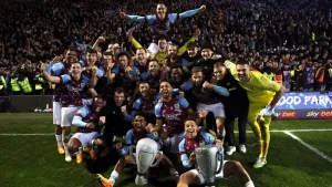 Manuel Benson ensures Burnley wrap up Championship title at home of their rivals
