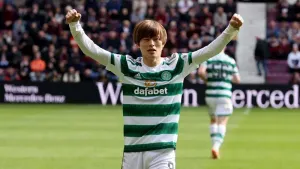 Celtic wrap up league title with victory at 10-man Hearts