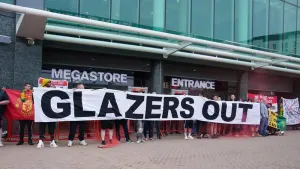 Manchester United fans block megastore entrance in protest against Glazer family