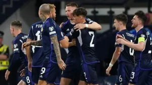 Scotland beat Georgia – and the weather – to move eight points clear in Group A