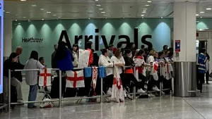 England return from World Cup but leave fans waiting in Heathrow arrivals hall