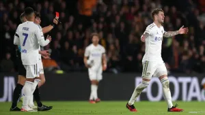 Joe Rodon sent off as Leeds hang on for draw at Hull