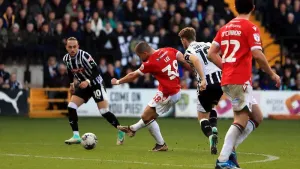 Wrexham wipe out gap to Notts County with late double