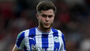 Wigan ease past 10-man Fleetwood