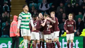 Jeers ring round Parkhead as Hearts win at Celtic