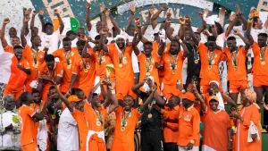 Ivory Coast players celebrate after winning the African Cup of Nations final against Nigeria (Sunday Alamba/AP).