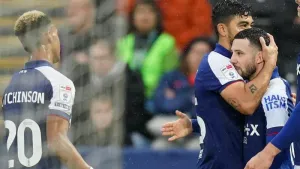 Ipswich maintain top-two push with win at Swansea