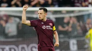 Lawrence Shankland scores from the spot as Hearts hit back to draw with Hibs