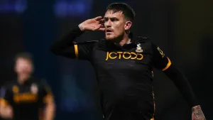 Wrexham suffer third straight league loss as Andy Cook snatches win for Bradford