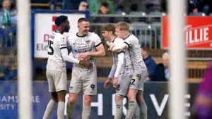 Colby Bishop double fires leaders Portsmouth to win at Wycombe