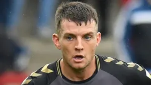 Cheltenham’s survival hopes take a huge hit after defeat at home to Carlisle