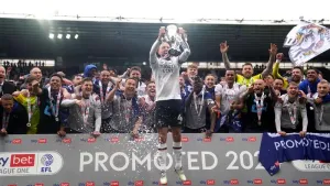 Derby’s Paul Warne taking his dog for a walk before promotion party can begin