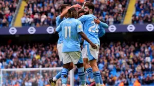 Five-star Manchester City blow away Luton to return to the Premier League summit