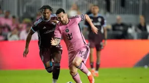 Inter Miami forward Lionel Messi vies with Colorado Rapids forward Kimani Stewart-Baynes (Rebecca Blackwell/AP)