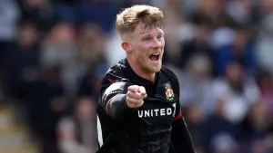 Wrexham ease to victory against 10-man Crewe