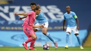 Luka Modric, left, and Manchester City’s Rodri will do battle on Saturday (Dave Thompson/PA)